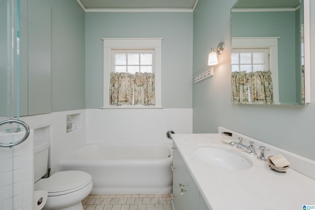 full bath with vanity, ornamental molding, a garden tub, toilet, and tile patterned floors