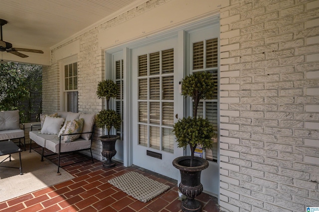 view of patio with an outdoor living space and ceiling fan