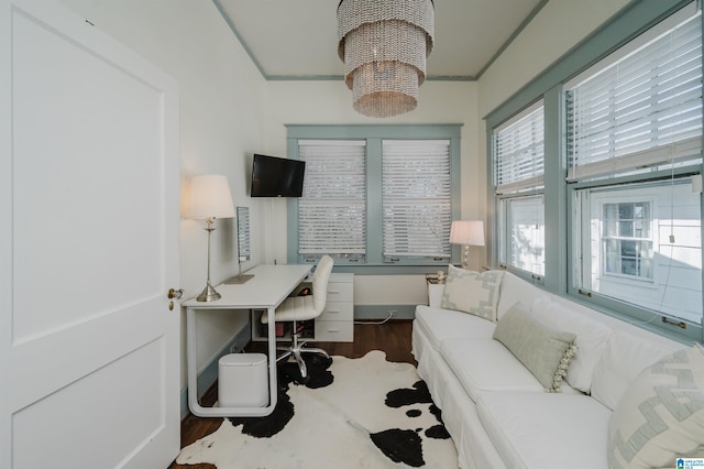 office space featuring a chandelier and dark wood-type flooring