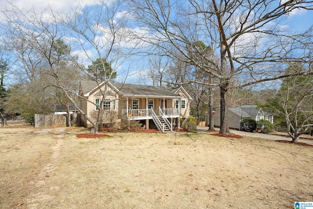 view of front of house with a porch and stairway