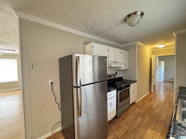 kitchen with light wood-style flooring, appliances with stainless steel finishes, ornamental molding, white cabinets, and under cabinet range hood