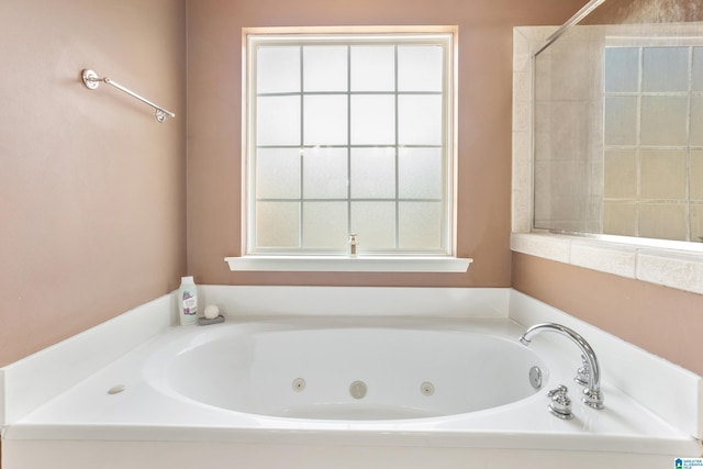 full bath featuring a jetted tub