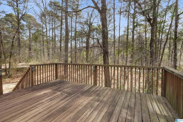 wooden terrace with a forest view