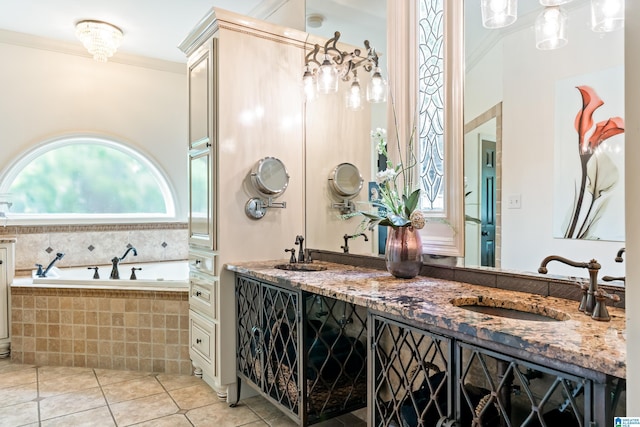 full bath featuring ornamental molding, a sink, a bath, and tile patterned floors