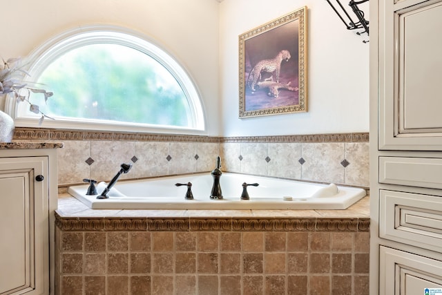 bathroom with a garden tub