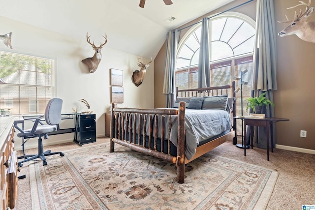 bedroom with ceiling fan, light colored carpet, visible vents, baseboards, and vaulted ceiling