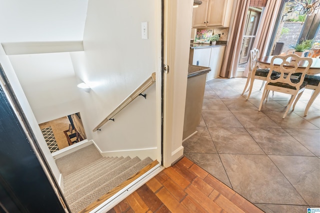 stairs with wood finished floors