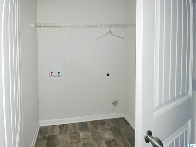 laundry area with hookup for a washing machine, laundry area, hookup for an electric dryer, and baseboards