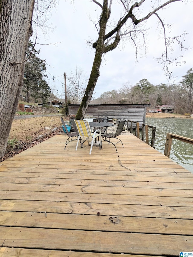 deck featuring a water view