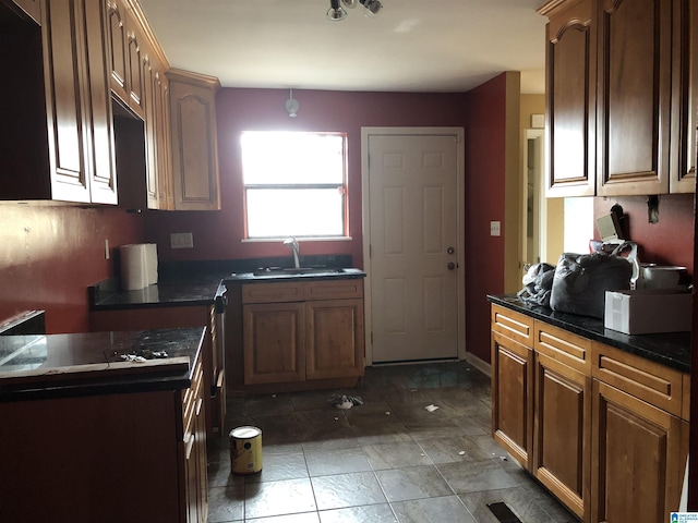 kitchen with white microwave and a sink