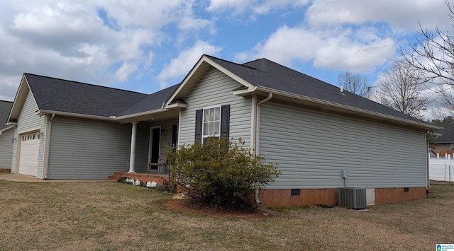 view of property exterior featuring cooling unit, crawl space, a garage, a shingled roof, and a lawn