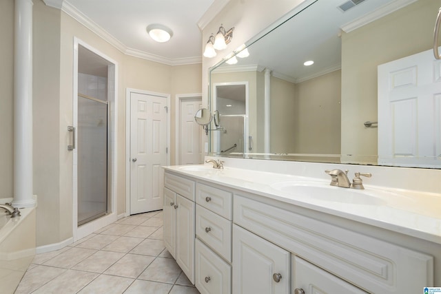 bathroom with ornamental molding, a sink, and a shower stall