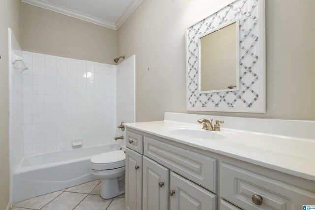 full bath featuring bathing tub / shower combination, toilet, tile patterned floors, crown molding, and vanity