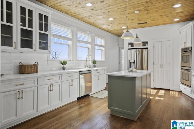 kitchen featuring stainless steel appliances, dark wood-style flooring, wooden ceiling, and decorative backsplash