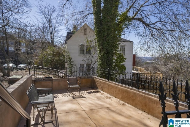 view of patio with fence