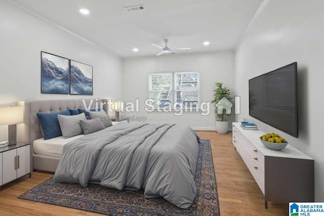 bedroom with light wood-type flooring, visible vents, a ceiling fan, and recessed lighting