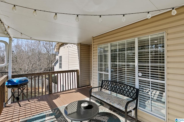 wooden deck with grilling area