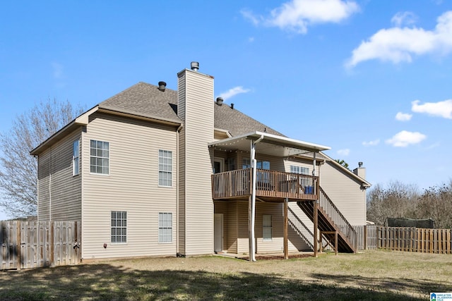 back of house with stairway, a chimney, a fenced backyard, and a wooden deck