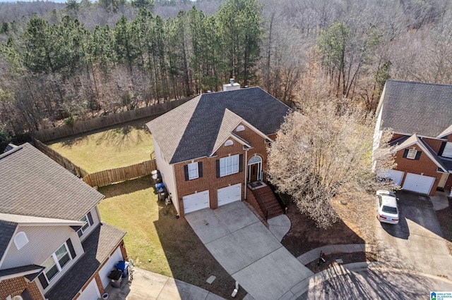 aerial view with a wooded view