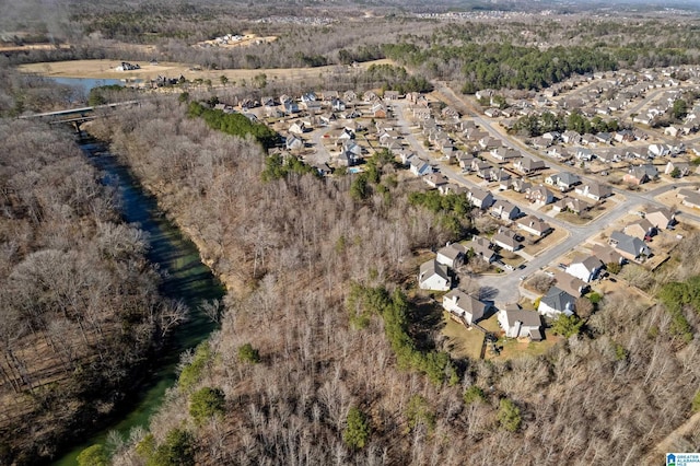 aerial view featuring a water view and a residential view