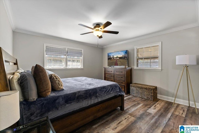 bedroom featuring multiple windows, crown molding, baseboards, and wood finished floors