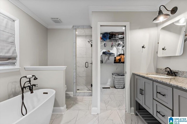 full bathroom with visible vents, marble finish floor, ornamental molding, a stall shower, and a walk in closet