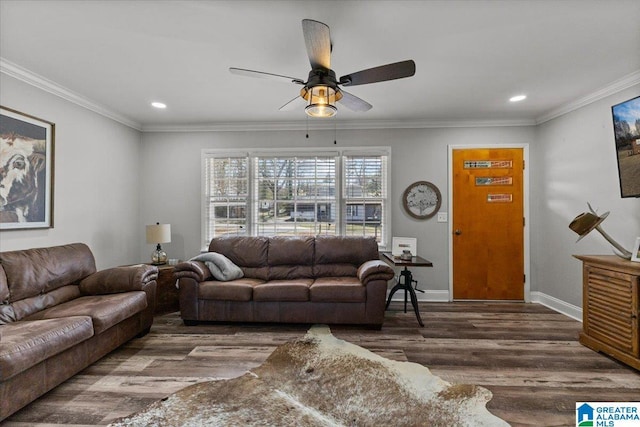 living room with ornamental molding, recessed lighting, wood finished floors, and baseboards