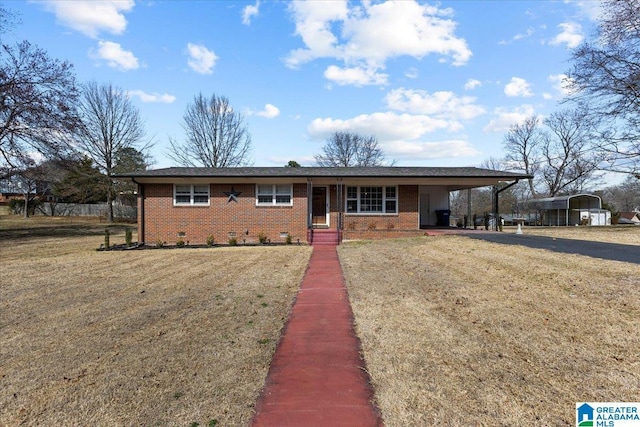 view of front of home with crawl space, a front lawn, a carport, and brick siding