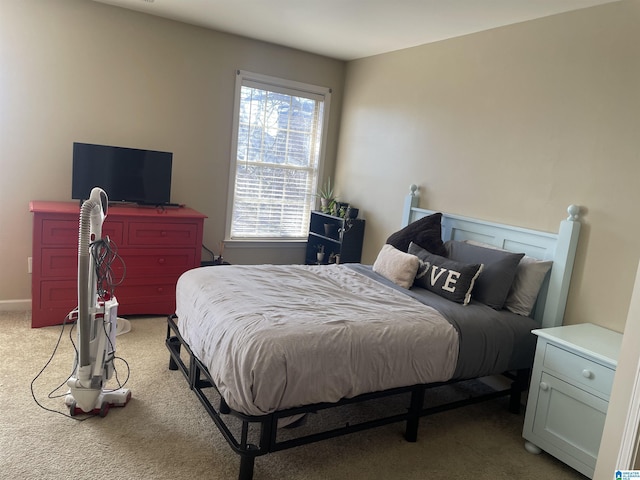 bedroom with light colored carpet