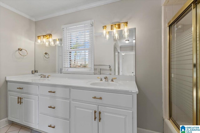 full bath with ornamental molding, a shower with door, a sink, and double vanity