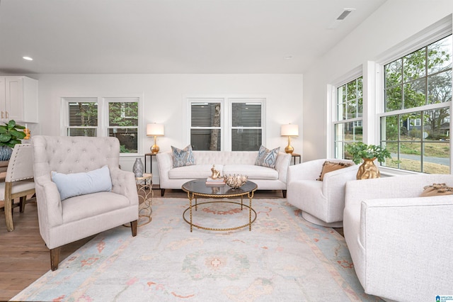 living area featuring recessed lighting and wood finished floors