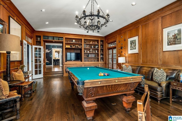 rec room with lofted ceiling, built in shelves, dark wood-style flooring, and french doors