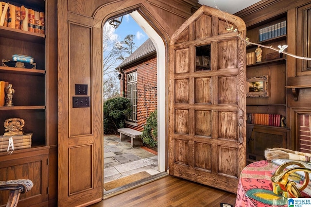 entryway with wood finished floors