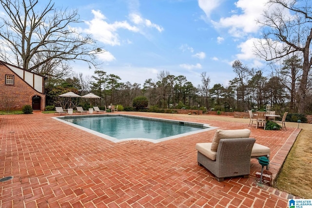 pool with a patio