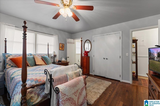 bedroom featuring a ceiling fan and wood finished floors