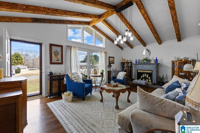 living area with high vaulted ceiling, beamed ceiling, a fireplace, and dark wood finished floors