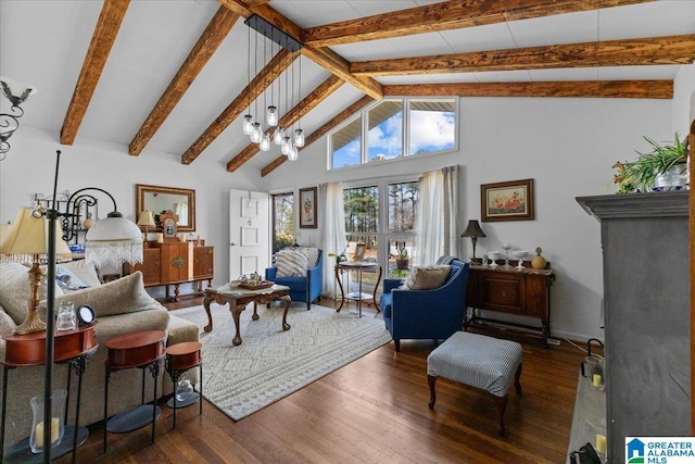 living area with high vaulted ceiling, a chandelier, beamed ceiling, and wood finished floors