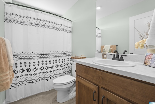 bathroom with tile patterned flooring, a shower with curtain, toilet, and vanity