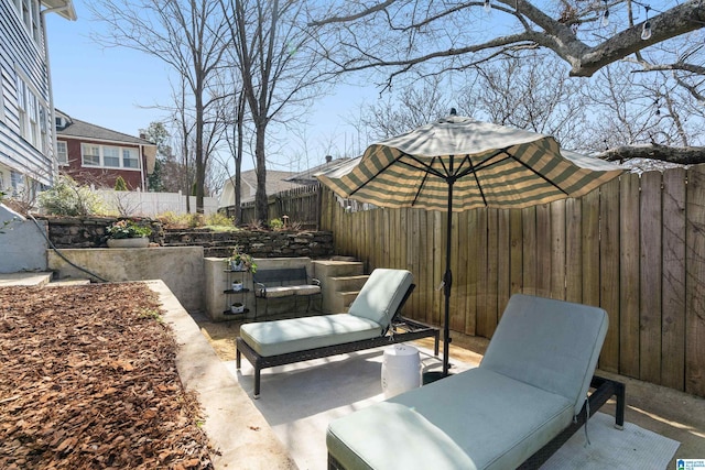 view of patio / terrace featuring outdoor lounge area and a fenced backyard