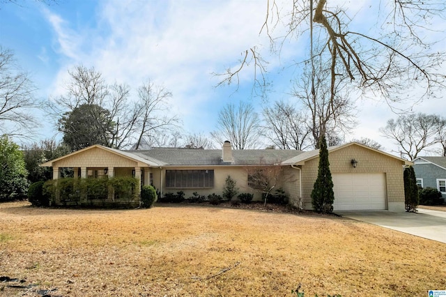 ranch-style house with a garage, concrete driveway, and a chimney