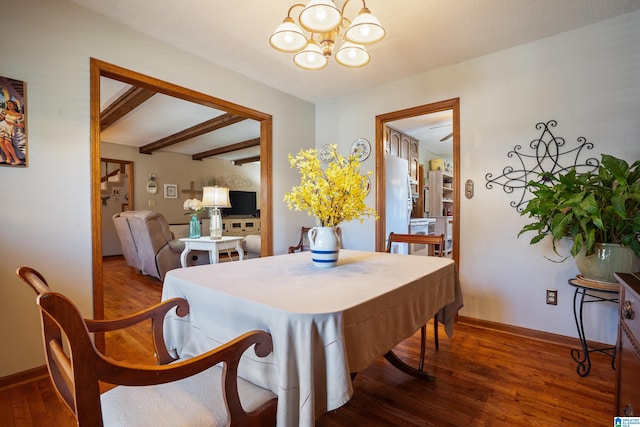 dining room with baseboards, beamed ceiling, wood finished floors, and a notable chandelier