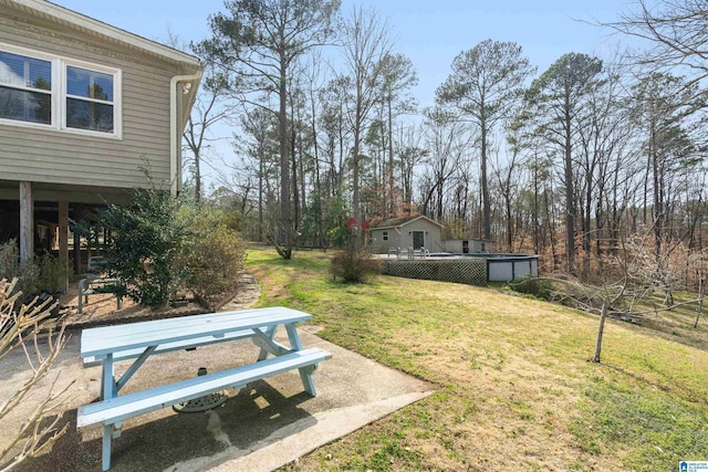 view of yard featuring a wooden deck