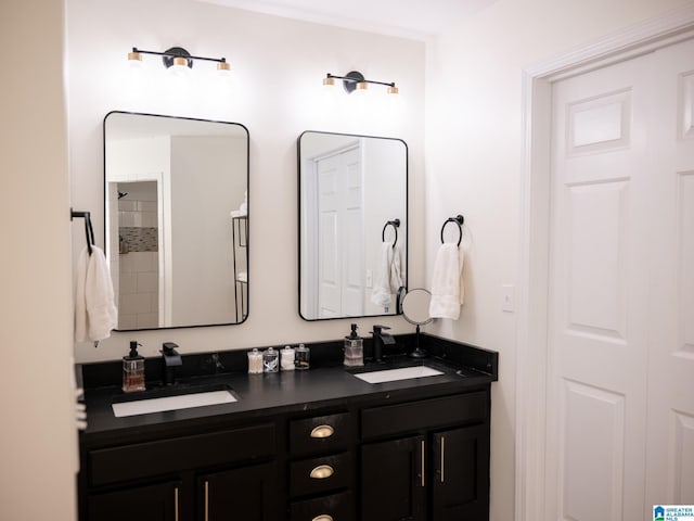 bathroom with a sink and double vanity