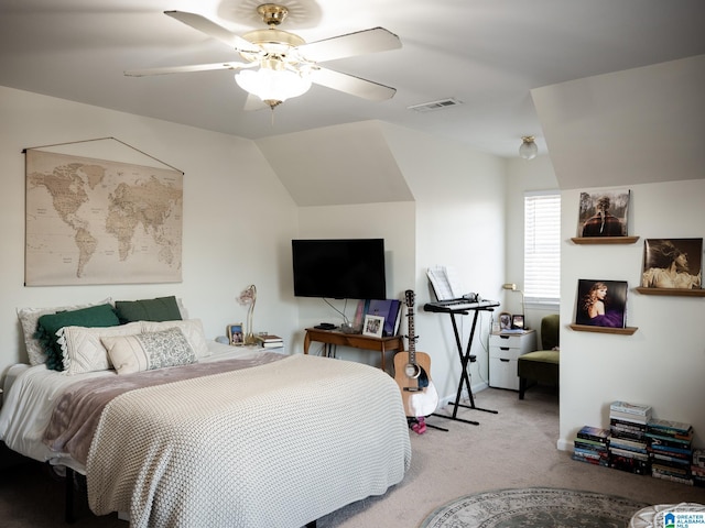 bedroom featuring lofted ceiling, ceiling fan, carpet flooring, and visible vents