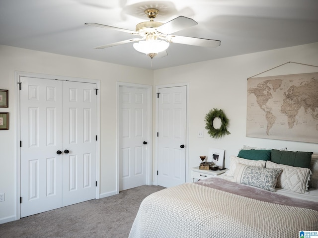 carpeted bedroom with a ceiling fan