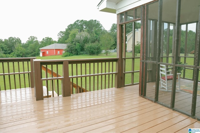 6645 Red Leaf Ln, Hueytown, AL 35023 - deck with a sunroom and a lawn