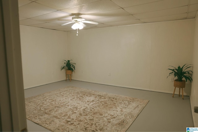 6645 Red Leaf Ln, Hueytown, AL 35023 - unfurnished room featuring a paneled ceiling, a ceiling fan, and concrete flooring