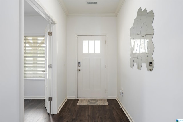 foyer with baseboards, a healthy amount of sunlight, ornamental molding, and dark wood-style flooring