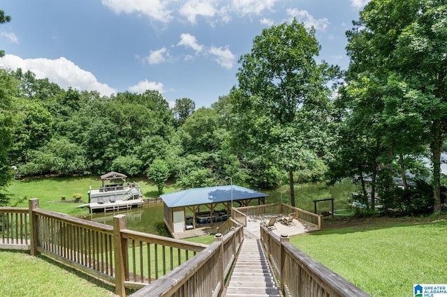 view of dock featuring a yard