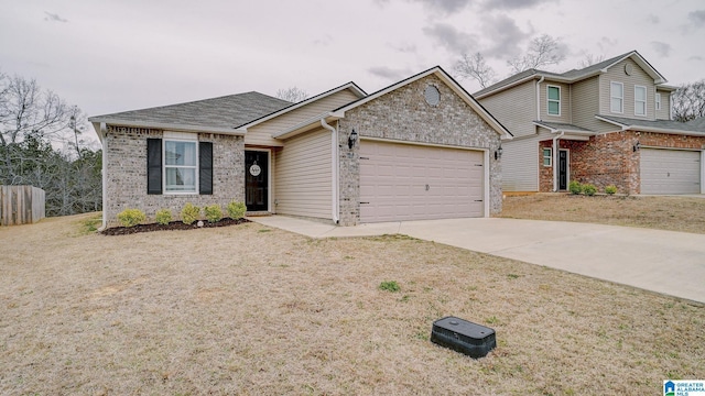 view of front facade featuring a garage, brick siding, and driveway